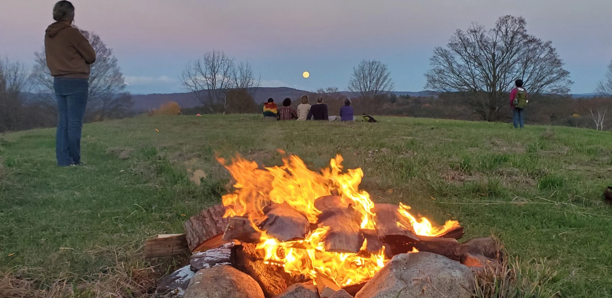 Moon Fire Foreground Spectators Background Scaled
